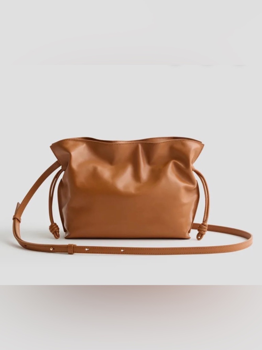 Quince Italian Leather Drawstring Pouch Crossbody Bag in Cognac